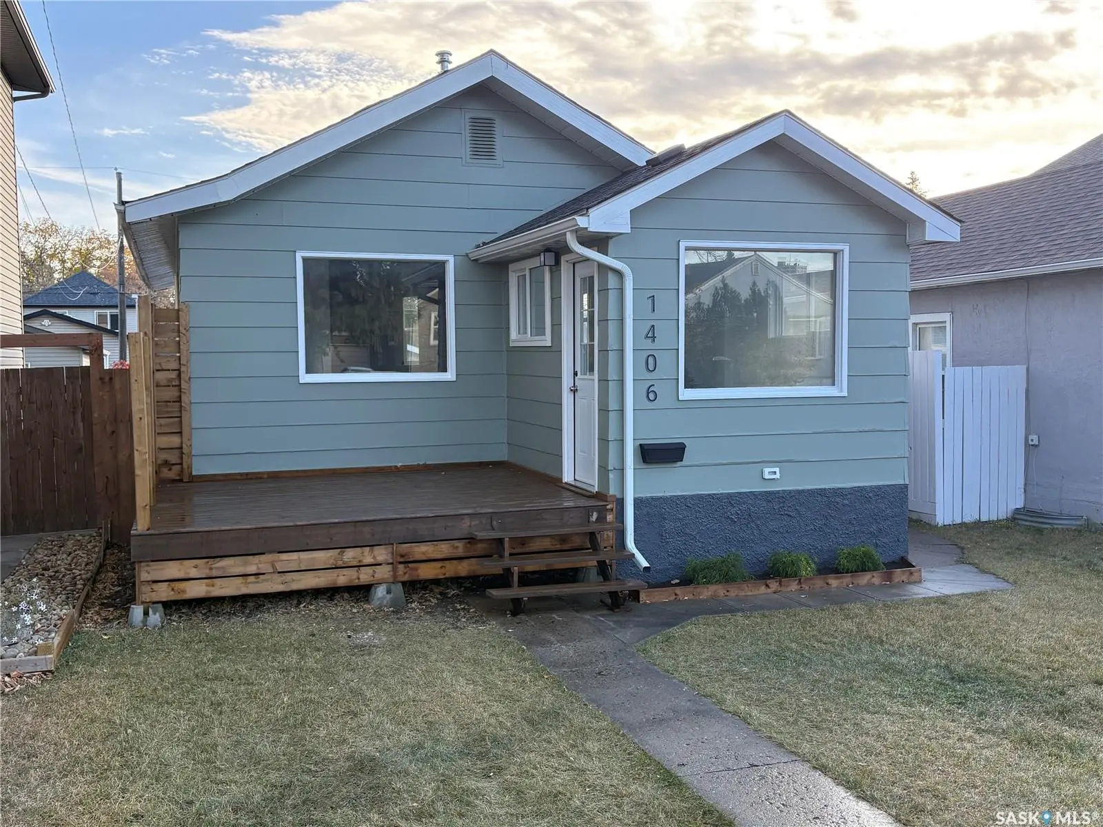Exterior photo of 1406 6th Avenue N, Saskatoon SK — fully renovated bungalow with new double garage in North Park.